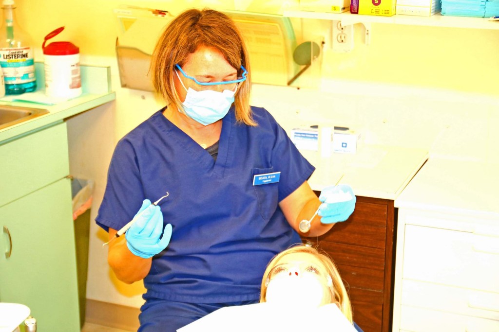Staff member caring for patient